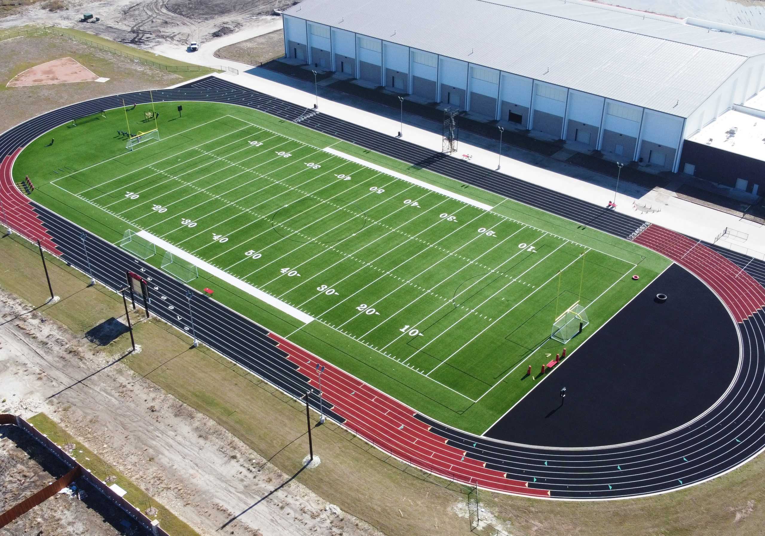 A football field installed by Symmetry Sports Construction